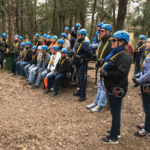 Team gathered for an outdoor course